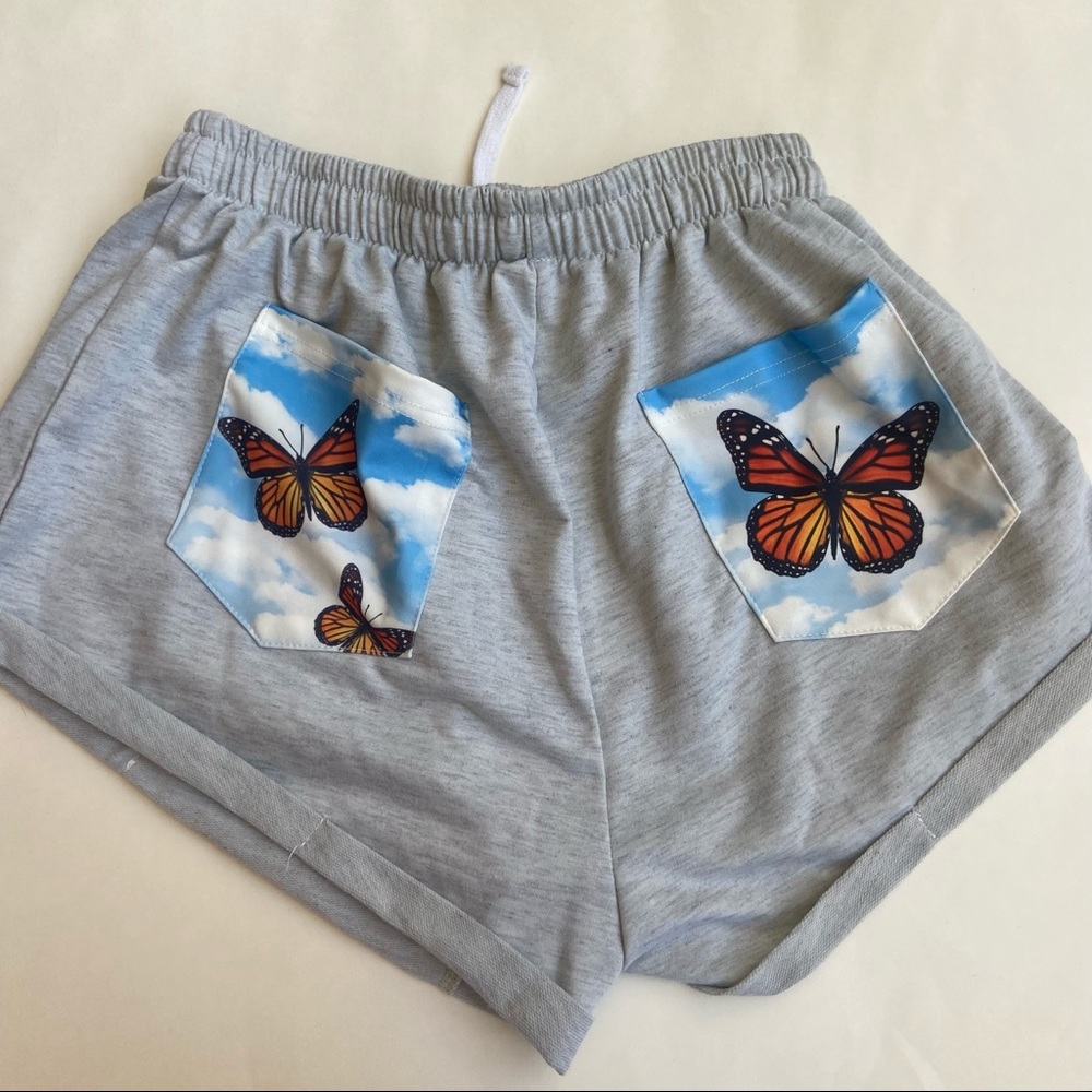 Gray lounge shorts with butterfly design